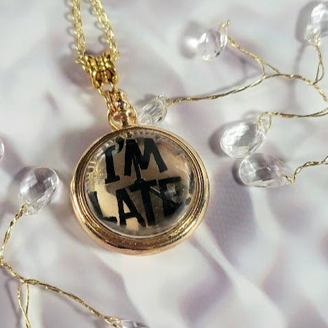 Whimsical Alice in Wonderland inspired gold necklace with "I'M LATE" Engraving