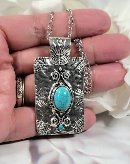 Fashionable Faux Turquoise Necklace, Bold Silver Statement, Vintage-Themed Accessory