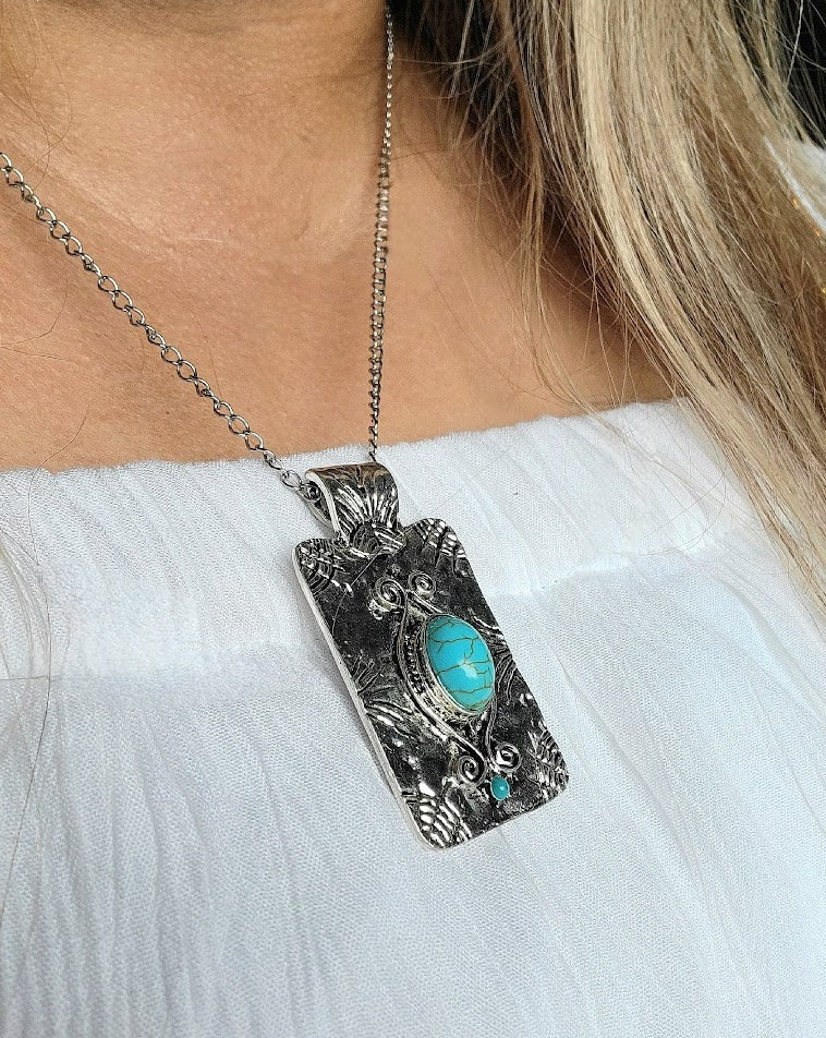 Fashionable Faux Turquoise Necklace, Bold Silver Statement, Vintage-Themed Accessory