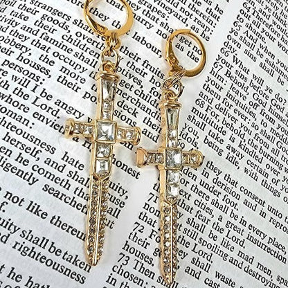 Sparkling Gold Dagger Earrings, Bold Long Dangle, Edgy Shimmering Jewelry, Unique Religious Gold Sword Pendants, Faith Based Spiritual Accessory