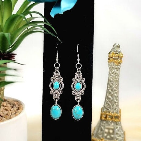 Faux Turquoise Oasis Earring, Elegant Long Dangle, Howlite Oval Pendants, Serene Ocean-Inspired Jewelry, Timeless Elegant Accessory