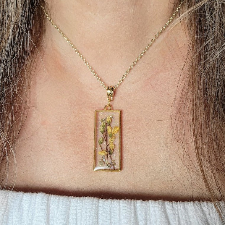 Yellow Bud Encapsulated Necklace, Gold Shimmer Resin Pendant, Handcrafted Botanical Jewelry, Unique Seashell & Vine Combination, Eco-Friend