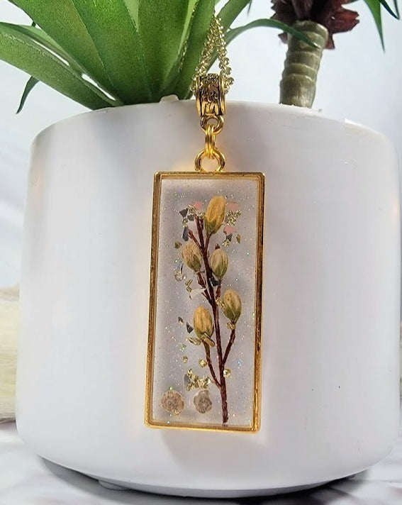 Yellow Bud Encapsulated Necklace, Gold Shimmer Resin Pendant, Handcrafted Botanical Jewelry, Unique Seashell & Vine Combination, Eco-Friend