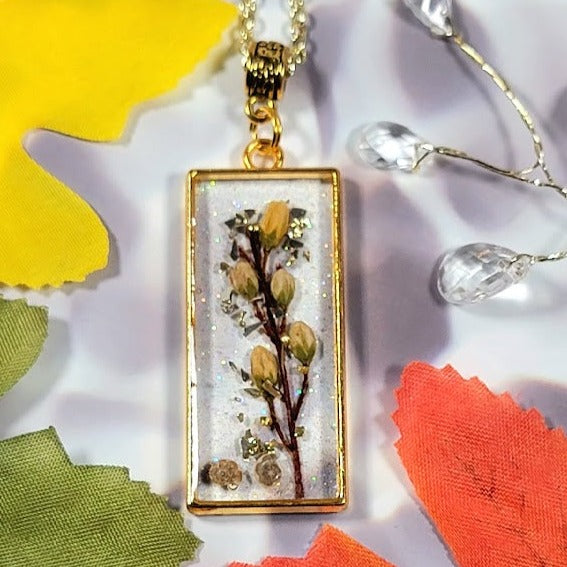 Yellow Bud Encapsulated Necklace, Gold Shimmer Resin Pendant, Handcrafted Botanical Jewelry, Unique Seashell & Vine Combination, Eco-Friend