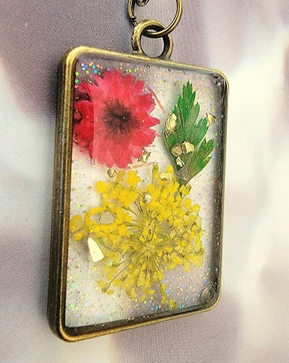 Sunlit Meadow-Inspired Necklace, Handmade Flora Resin Art Pendant, Yellow Baby's Breath Jewelry, Red Carnation Bud Charm, Nature-Inspired Accessory