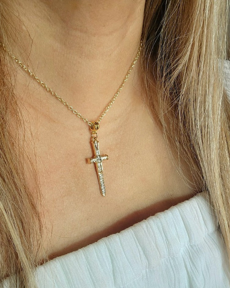 Radiant Rhinestone Gold Cross & Dagger Necklace, Elegant Faith Emblem Pendant, Unisex Spiritual Statement Jewelry