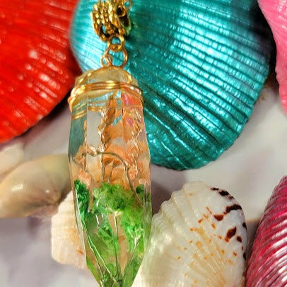 Floral-Encased Gold Resin Necklace , Wire-Wrapped Flower Crystal Pendant