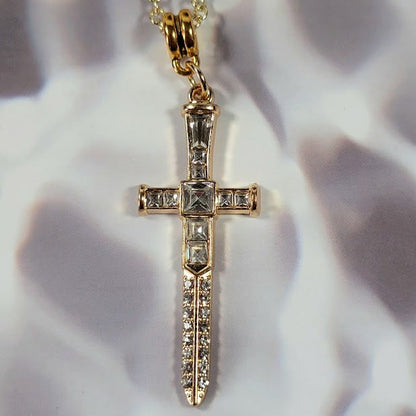 Radiant Rhinestone Gold Cross & Dagger Necklace, Elegant Faith Emblem Pendant, Unisex Spiritual Statement Jewelry