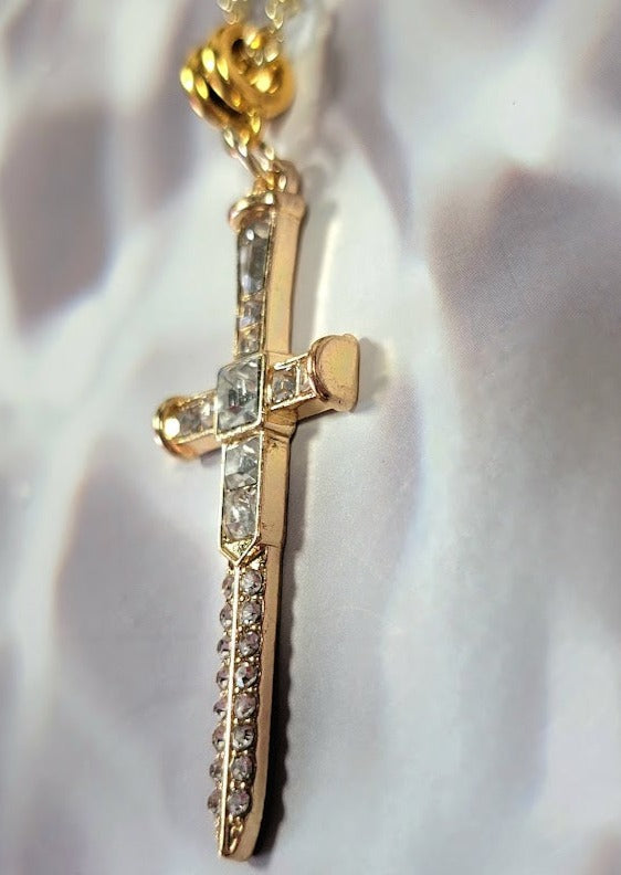 Radiant Rhinestone Gold Cross & Dagger Necklace, Elegant Faith Emblem Pendant, Unisex Spiritual Statement Jewelry