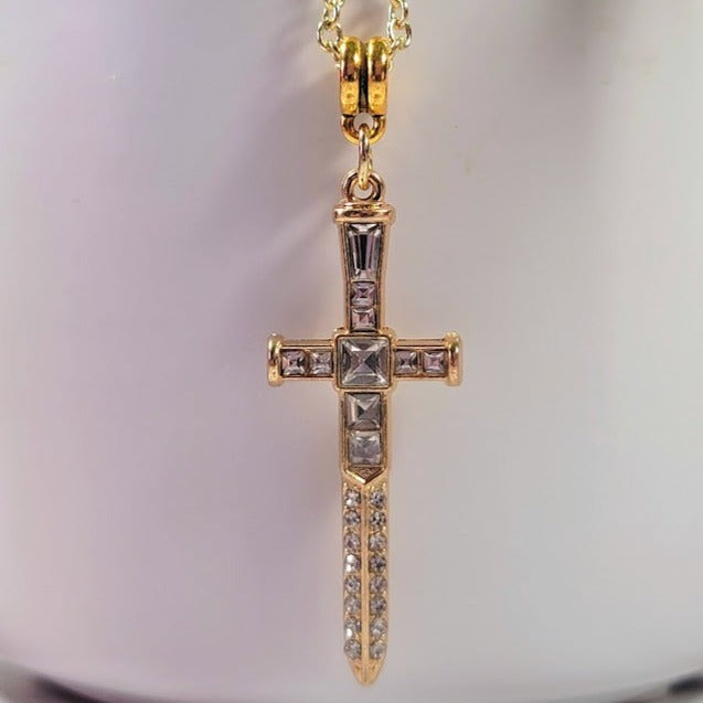 Radiant Rhinestone Gold Cross & Dagger Necklace, Elegant Faith Emblem Pendant, Unisex Spiritual Statement Jewelry