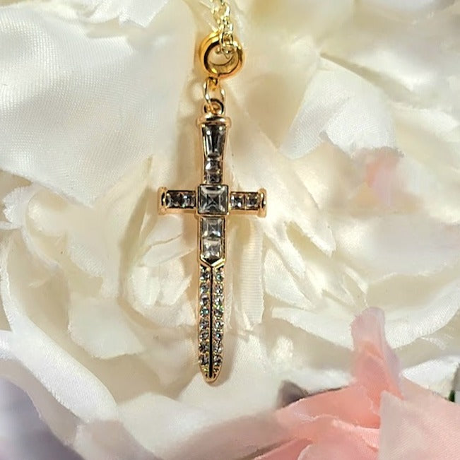 Radiant Rhinestone Gold Cross & Dagger Necklace, Elegant Faith Emblem Pendant, Unisex Spiritual Statement Jewelry