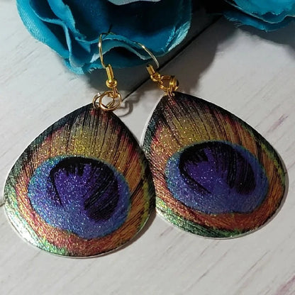 Boucles d'oreilles pendantes en forme de larme de paon pour femmes confiantes, bijou audacieux, pendentif coloré éblouissant, parfait pour les soirées élégantes