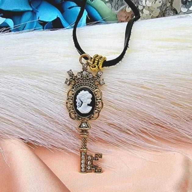 Captivating Gold Key with Cameo Emblem Necklace