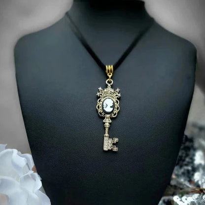 Captivating Gold Key with Cameo Emblem Necklace