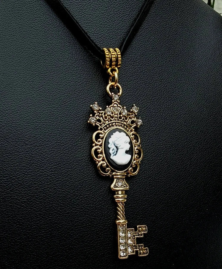 Captivating Gold Key with Cameo Emblem Necklace