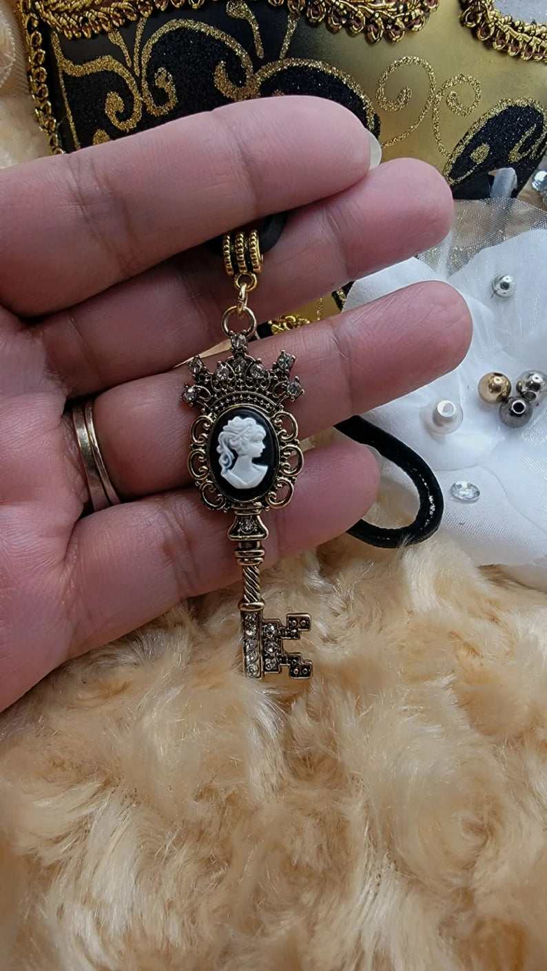 Captivating Gold Key with Cameo Emblem Necklace