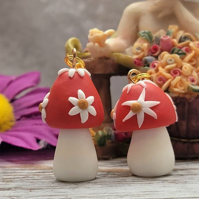 Whimsical mushroom earrings, radiating artisanal flair. With meticulously crafted petals and a vibrant hue, they're a captivating nod to enchanted forests and fairy tales. Perfect for those who cherish the magic in details. 🍄✨🌲