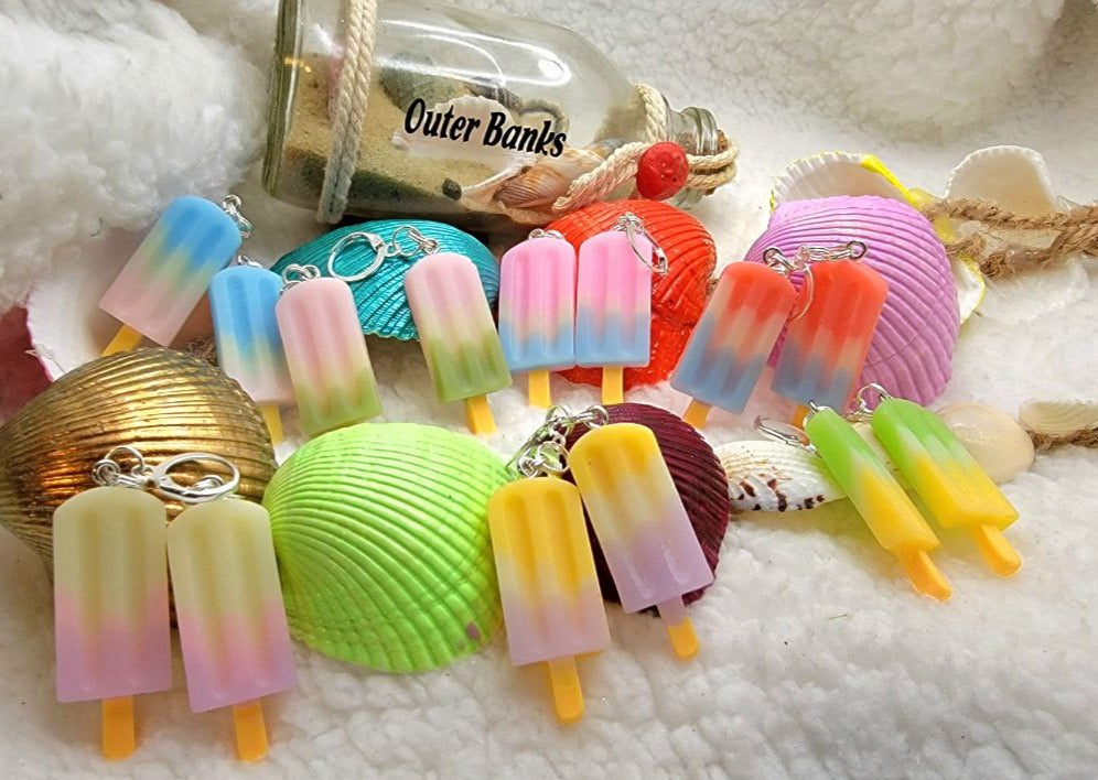 Pastel popsicle charms, as sweet as summer memories. Perfectly paired with whimsical vibes. 🍦🌸👼