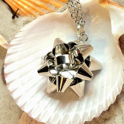 Shiny Silver Ribbon Necklace, Bow Design Pendant, Christmas Glam Accessory, Festive Jewelry for Holiday Party