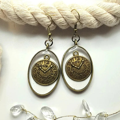 Boucle d’oreille chronomètre en bronze antique, bijoux d’horlogerie scellés en résine, accessoire historique d’inspiration victorienne, style Steampunk élégamment conçu