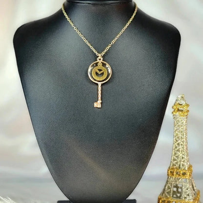 Collier de clé Steampunk en bronze antique intemporel, pendentif d’engrenage de roue, bijoux uniques faits à la main, accessoire unisexe, design élégant et distinctif