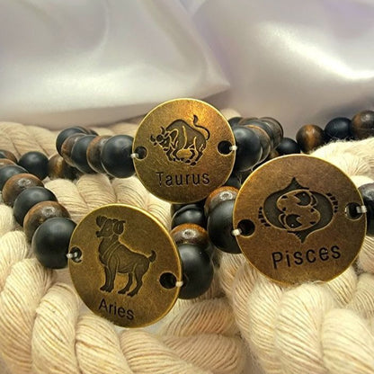 Pulsera atemporal hecha a mano con signos del zodíaco, la moda celestial se une al encanto cósmico, cuentas en tonos tierra con ónix mate y vibraciones místicas