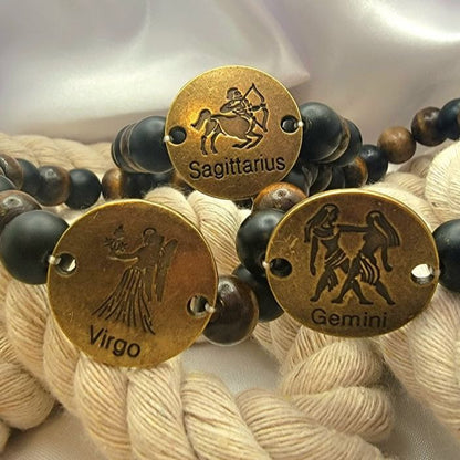 Pulsera atemporal hecha a mano con signos del zodíaco, la moda celestial se une al encanto cósmico, cuentas en tonos tierra con ónix mate y vibraciones místicas