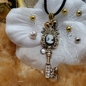 Captivating Gold Key with Cameo Emblem Necklace